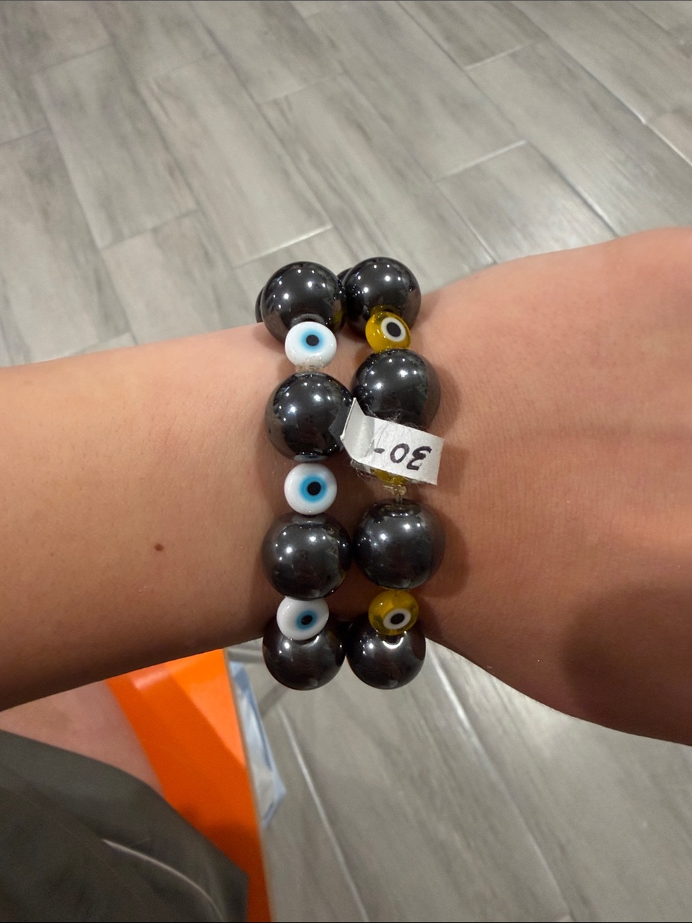 Black Beaded Bracelet with Blue and Yellow Accent Beads